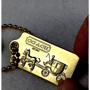 Coach metal bag tag goldtone Stagecoach 1 34" x 7/8"Ball chain included EUC